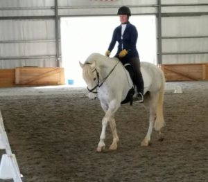 Holly Linz and Vadriero during an April 2019 dressage test